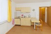 Kleine Küche mit integriertem Eßplatz